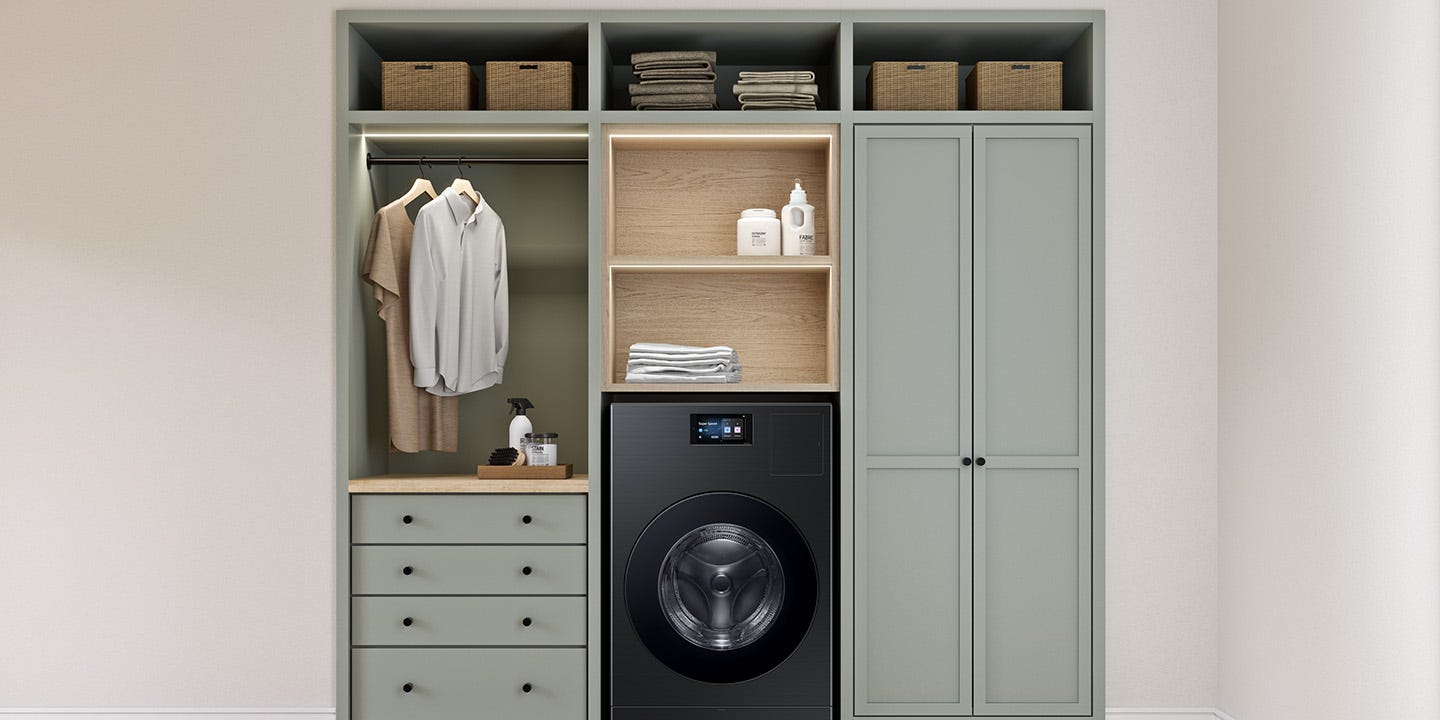 laundry area with storage and washing machine