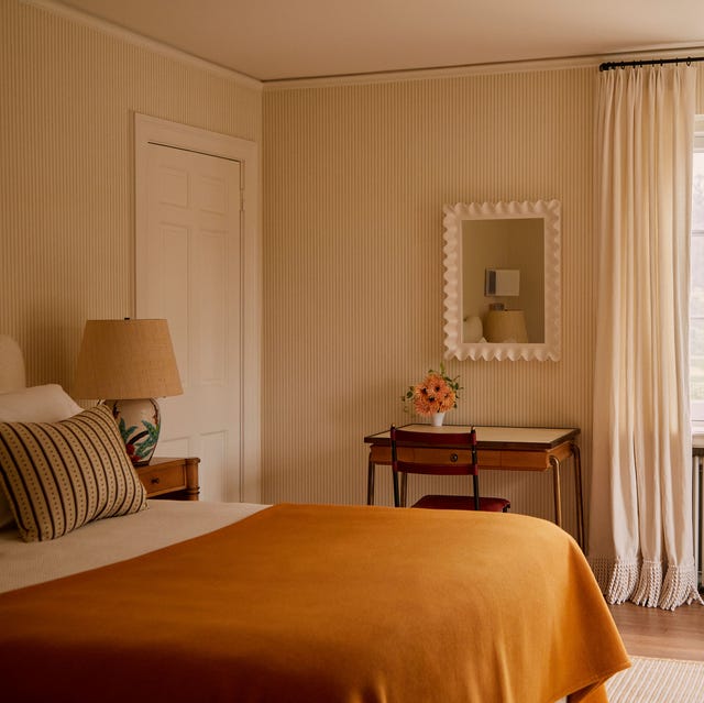 Cozy bedroom with warm tones and natural lighting Cozy bedroom with warm tones and natural lighting