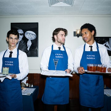 Servers presenting drinks at an event