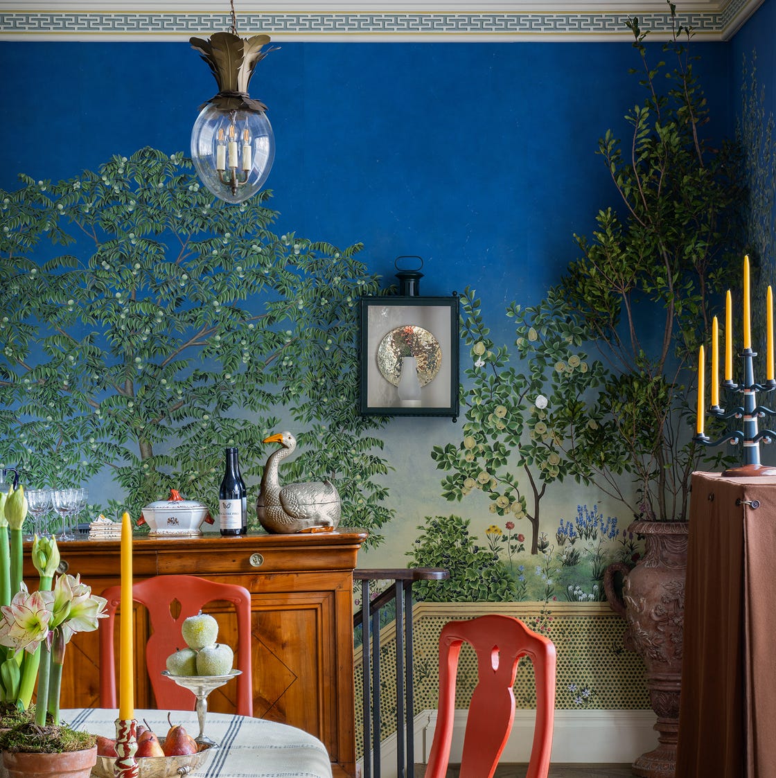 dining area with decorative elements and vibrant wall mural.