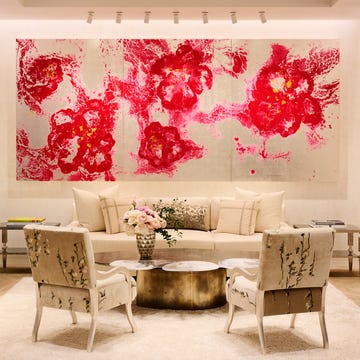 Lounge area featuring modern decor with floral artwork.