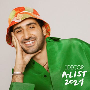 A-List 2024 - ELLE DECOR person in green shirt and orange and green hat