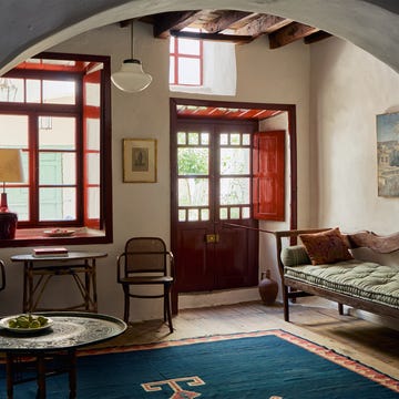 Cozy interior space featuring seating and natural light.