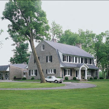 large barn house on a large parcel of land