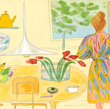 illustration in yellow hues with a woman in a colored dress by the sink with a table and flowers and pendant light
