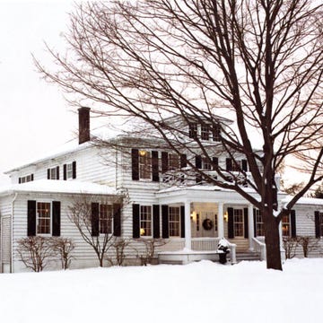 large house with snow outside