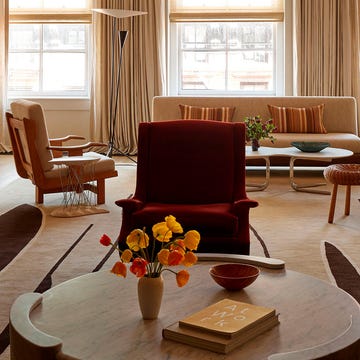 salon con dos ambientes en una casa tipo loft