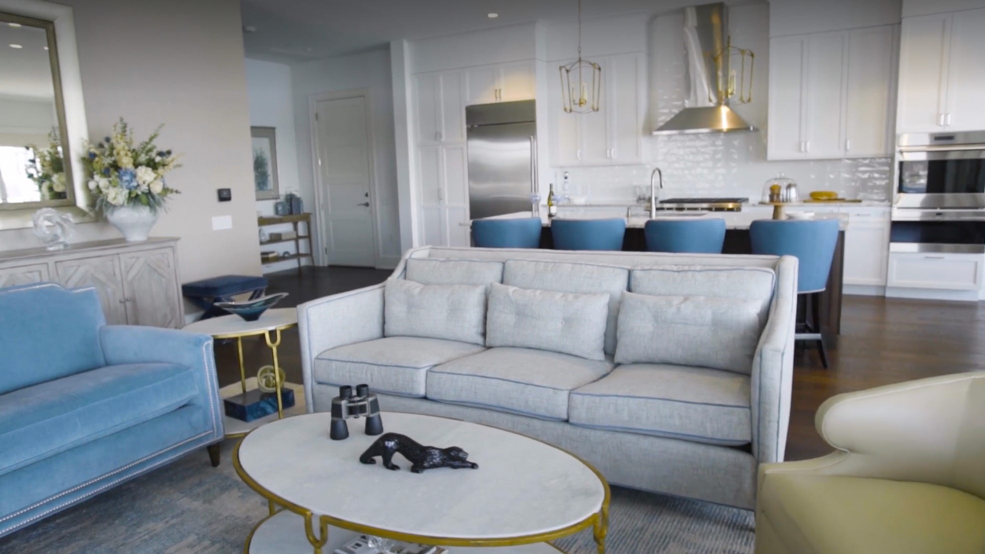 Collection of blue and white ceramics arranged on a wooden table.